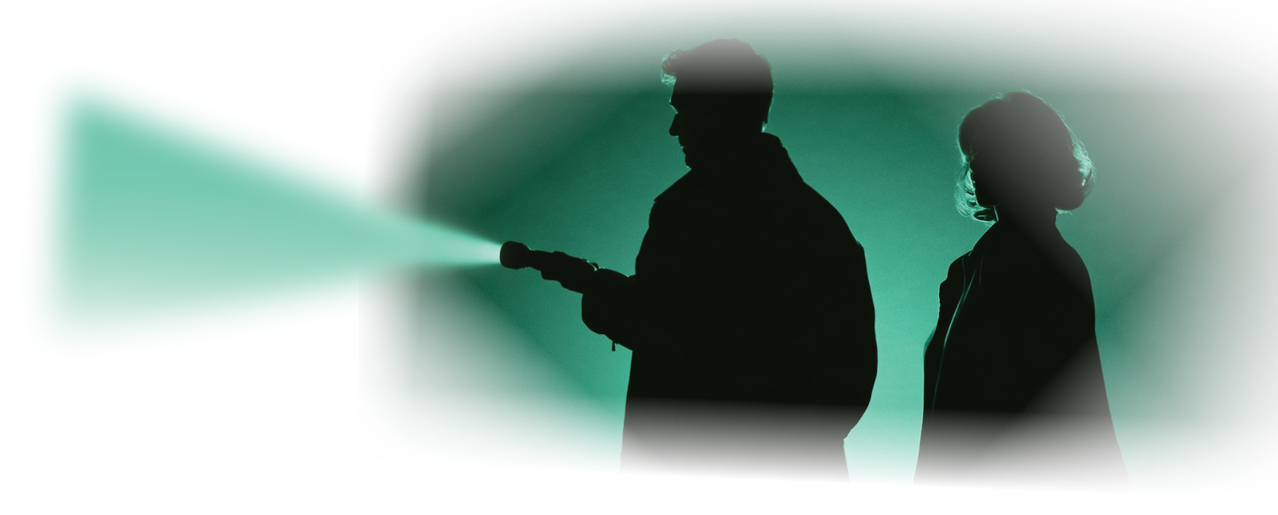 Two investigators in silhouette, one shining a flashlight toward the headline